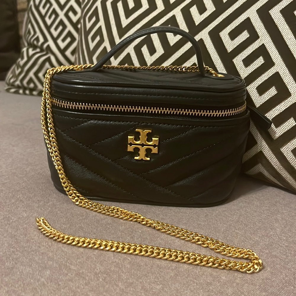 Kira Chevron Mini Vanity Case. Napa leather with zipper closure w/ Top handle.